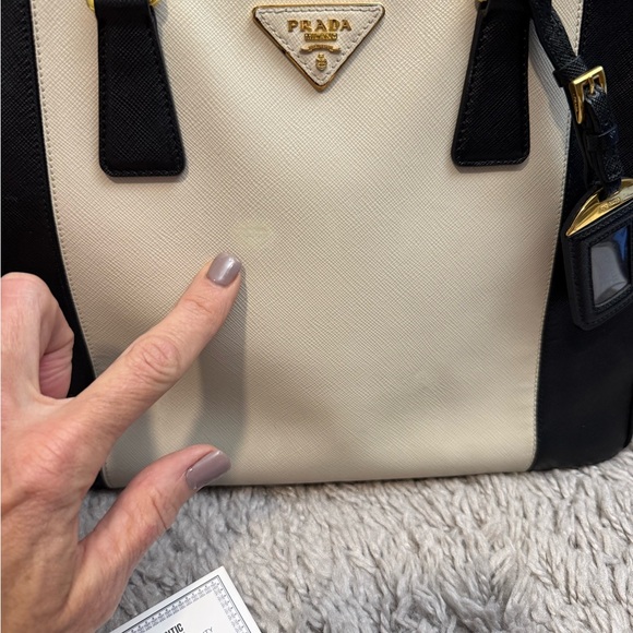 Prada Black and Cream Satchel
Saffiano Leather
Beautiful Handbag - Picture 7 of 12